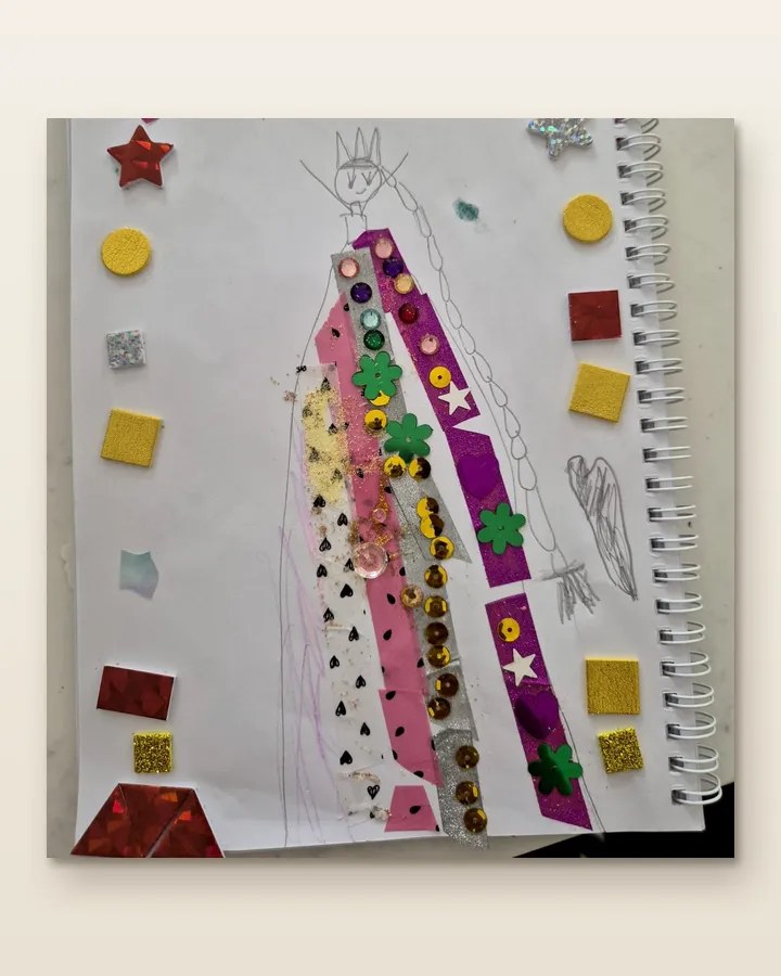 Their photo of the drawing: a queen in a sequinned dress, pencil and stickers on a sketchbook page, taken on a phone.