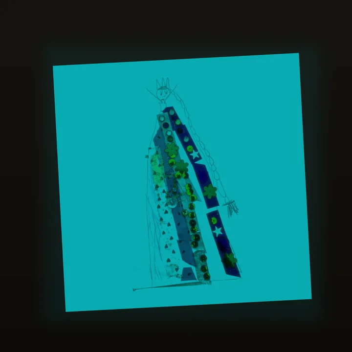 The same print with the lights off: the page glows blue-green around every line and sequin.